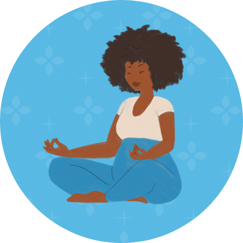 a woman sitting cross legged with her hands in the air